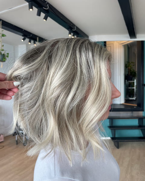 Blonde with highlights and hair cut